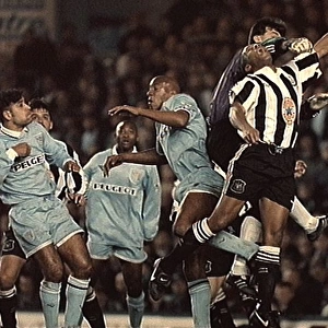 Les Ferdinand Leaps for the Ball: Coventry City vs. Newcastle United