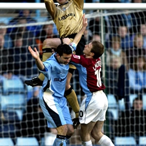 Luke Steele: Coventry City Goalkeeper Faces Intense Pressure from Burnley's Ian Moore (12-02-2005)