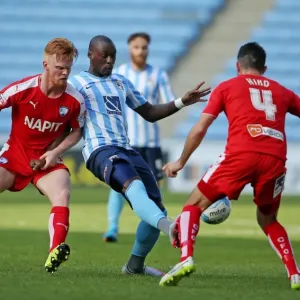 Marc-Antoine Fortune Battles Past Chesterfield Defenders in Coventry City's Sky Bet League One Match Marc-Antoine Fortune Battles Past Chesterfield Defenders in Coventry City's Sky Bet League One Match