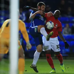Michael Bostwick vs Marc Antoine Fortune: Intense Battle for Ball Possession in Peterborough United vs Coventry City, Sky Bet League One Michael Bostwick vs Marc Antoine Fortune: Intense Battle for Ball Possession in Peterborough United vs Coventry City, Sky Bet League One