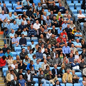 Npower Championship Showdown: Coventry City vs Reading - Intense Focus of Coventry Fans at Ricoh Arena (September 24, 2011)