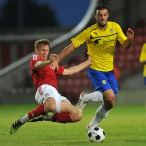Pre-Season Clash: Bruno Constantin Tackled at Wrexham's Racecourse Ground Pre-Season Clash: Bruno Constantin Tackled at Wrexham's Racecourse Ground