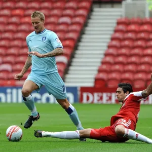 Rhys Williams vs. Carl Baker: Intense Battle at the Riverside - Coventry City vs. Middlesbrough, Football League Championship (2011) Rhys Williams vs. Carl Baker: Intense Battle at the Riverside - Coventry City vs. Middlesbrough, Football League Championship (2011)