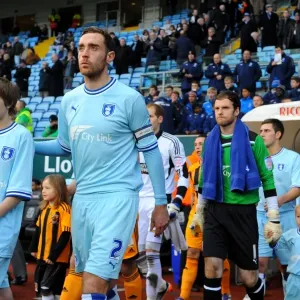 Richard Keogh and Coventry City Players Kick-Off against Hull City in Championship Match at Ricoh Arena (2011) Richard Keogh and Coventry City Players Kick-Off against Hull City in Championship Match at Ricoh Arena (2011)