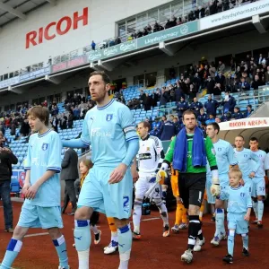 Richard Keogh and Coventry City Team Kick-Off against Hull City in Championship Match at Ricoh Arena (10-12-2011) Richard Keogh and Coventry City Team Kick-Off against Hull City in Championship Match at Ricoh Arena (10-12-2011)