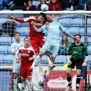 Richard Keogh and Middlesbroughs Matthew Bates battle for the ball Richard Keogh and Middlesbroughs Matthew Bates battle for the ball