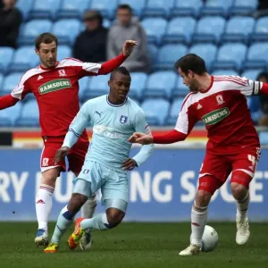 Rivalry's Intense Moment: Nimely vs. Bates Battle for the Ball (Coventry City vs. Middlesbrough, 2012) Rivalry's Intense Moment: Nimely vs. Bates Battle for the Ball (Coventry City vs. Middlesbrough, 2012)