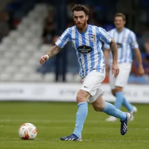 Romain Vincelot in Action: Coventry City's Pre-Season Friendly vs. Luton Town at Kenilworth Road Stadium Romain Vincelot in Action: Coventry City's Pre-Season Friendly vs. Luton Town at Kenilworth Road Stadium