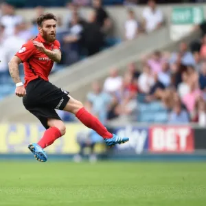 Romain Vincelot's Determined Shot: Coventry City vs Millwall in Sky Bet League One Romain Vincelot's Determined Shot: Coventry City vs Millwall in Sky Bet League One