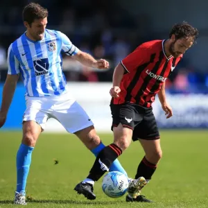 Sam Ricketts vs Danny Hylton: A Battle for the Ball - Coventry City vs Oxford United (Pre-Season Friendly) Sam Ricketts vs Danny Hylton: A Battle for the Ball - Coventry City vs Oxford United (Pre-Season Friendly)