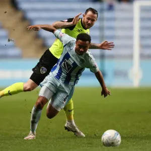 Showdown at Ricoh Arena: A League One Battle between Grant Ward and Rhys Murphy
