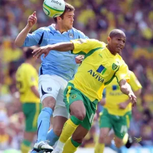 Simeon Jackson vs. Martin Cranie: Intense Rivalry in the Npower Championship Clash between Norwich City and Coventry City (07-05-2011) Simeon Jackson vs. Martin Cranie: Intense Rivalry in the Npower Championship Clash between Norwich City and Coventry City (07-05-2011)