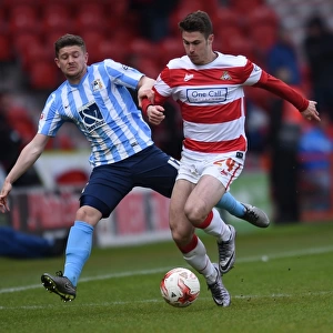 Tommy Rowe vs. Aaron Phillips: Intense Battle in Coventry City's Sky Bet League One Clash at Doncaster Rovers