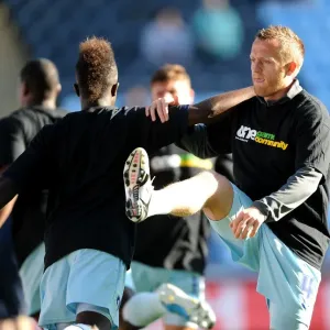 Warming Up: Gael Bigirimana and Sammy Clingan Prepare for Coventry City's Npower Championship Showdown Against Burnley (October 22, 2011, Ricoh Arena) Warming Up: Gael Bigirimana and Sammy Clingan Prepare for Coventry City's Npower Championship Showdown Against Burnley (October 22, 2011, Ricoh Arena)