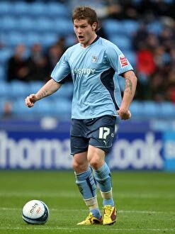 Images Dated 31st October 2009: Action-Packed Moment: Aron Gunnarsson of Coventry City Tackles Reading Opponent at Ricoh Arena