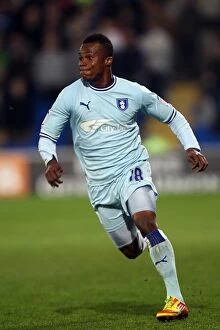 Images Dated 21st March 2012: Alex Nimely vs. Cardiff City: A Fierce Face-Off at Npower Championship Match (21-03-2012)