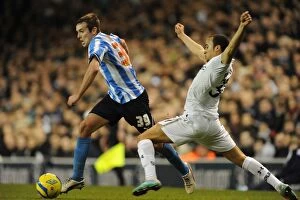 Images Dated 5th January 2013: Andros Townsend vs Blair Adams Clash: FA Cup Third Round at White Hart Lane (05-01-2013)