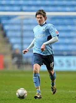 Images Dated 12th January 2010: Aron Gunnarsson in Action for Coventry City against Portsmouth in FA Cup Third Round Replay at