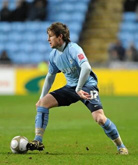 Images Dated 12th January 2010: Aron Gunnarsson in Action: Coventry City vs. Portsmouth, FA Cup Third Round Replay (January 12)