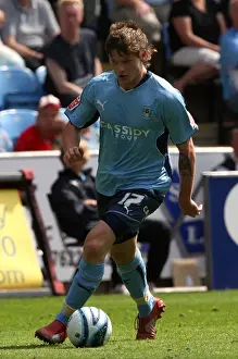 Images Dated 2009 August: Aron Gunnarsson's Epic Showdown: Coventry City vs Ipswich Town at Ricoh Arena (September 8)