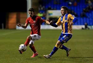 Season 2015-16 Prints: Battle for the Ball: Clarke vs. Lameiras in Intense Sky Bet League One Rivalry