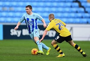 Images Dated 31st January 2015: Battle for the Ball: A Clash between John Fleck and Jamie Allen in Coventry City vs