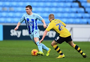 Images Dated 2015 January: Battle for the Ball: A Clash between John Fleck and Jamie Allen in Coventry City vs