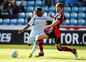 Images Dated 6th October 2012: Battle for the Ball: Coventry City vs. Bournemouth in Football League One