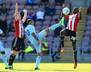Images Dated 29th September 2013: Battle for the Ball: Coventry City vs