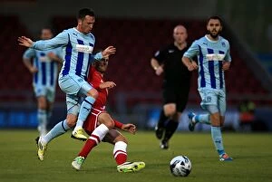 Images Dated 13th August 2014: Battle for the Ball: Coventry City vs. Cardiff City in the Capital One Cup