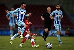 Battle for the Ball: Coventry City vs. Cardiff City in the Capital One Cup
