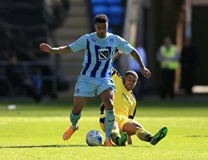Images Dated 11th April 2015: Battle for the Ball: Coventry City vs Colchester United in Sky Bet League One