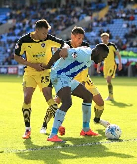 Images Dated 11th April 2015: Battle for the Ball: Coventry City vs Colchester United - Sky Bet League One