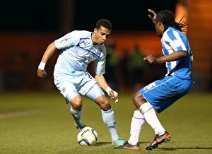 Images Dated 20th November 2012: Battle for the Ball: Coventry City vs. Colchester United - Npower Football League One