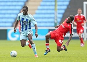 Images Dated 25th April 2015: Battle for the Ball: Coventry City vs Crewe Alexandra - Coventry's Frank Nouble