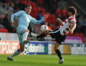 Images Dated 2011 October: Battle for the Ball: Coventry City vs. Doncaster Rovers in Championship Clash