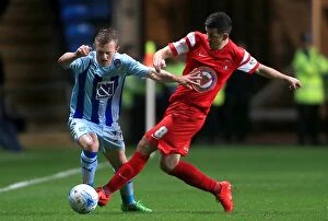 Images Dated 1st April 2015: Battle for the Ball: Coventry City vs Leyton Orient - Sky Bet League One