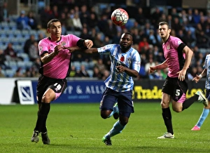 Images Dated 2015: Battle for the Ball: Coventry City vs Northampton Town in the Emirates FA Cup First Round