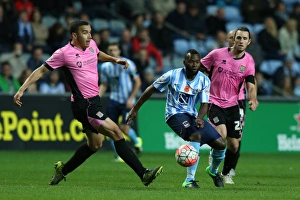 Images Dated 2015: Battle for the Ball: Coventry City vs Northampton Town - Emirates FA Cup First Round