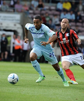 Images Dated 25th August 2013: Battle for the Ball: Coventry City vs