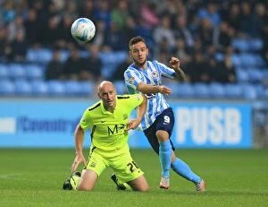 Images Dated 31st August 2015: Battle for the Ball: Coventry City vs. Southend United in Sky Bet League One - Adam Armstrong vs