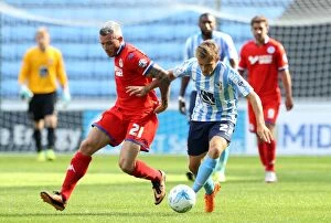 Images Dated 8th August 2015: Battle for the Ball: Coventry City vs. Wigan Athletic in Sky Bet League One