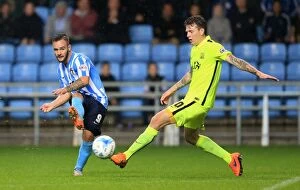 Images Dated 31st August 2015: Battle for the Ball: Coventry City's Armstrong vs. Southend's Rea