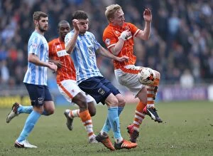 Images Dated 12th March 2016: Battle for the Ball: Cullen vs. Stephens in Sky Bet League One Clash