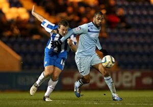 Colchester United v Coventry City : Weston Homes Community Stadium : 20-11-2012 Collection: Battle for the Ball: Eastman vs. McGoldrick in Npower League One Clash