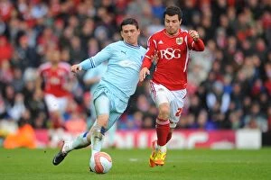 Images Dated 9th April 2012: Battle for the Ball: Foster vs. McDonald in Coventry City's Championship Clash at Ashton Gate