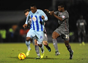 Images Dated 2013 November: Battle for the Ball: Franck Moussa vs