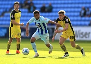 Images Dated 11th April 2015: Battle for the Ball: Grant Ward vs. Sammie Szmodics - Coventry City vs