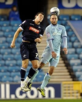 01-11-2011 v Millwall, The Den Collection: Battle for the Ball: Henderson vs. McPake in Millwall vs. Coventry City Championship Clash