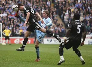 Images Dated 2009 March: Battle for the Ball: Henderson vs